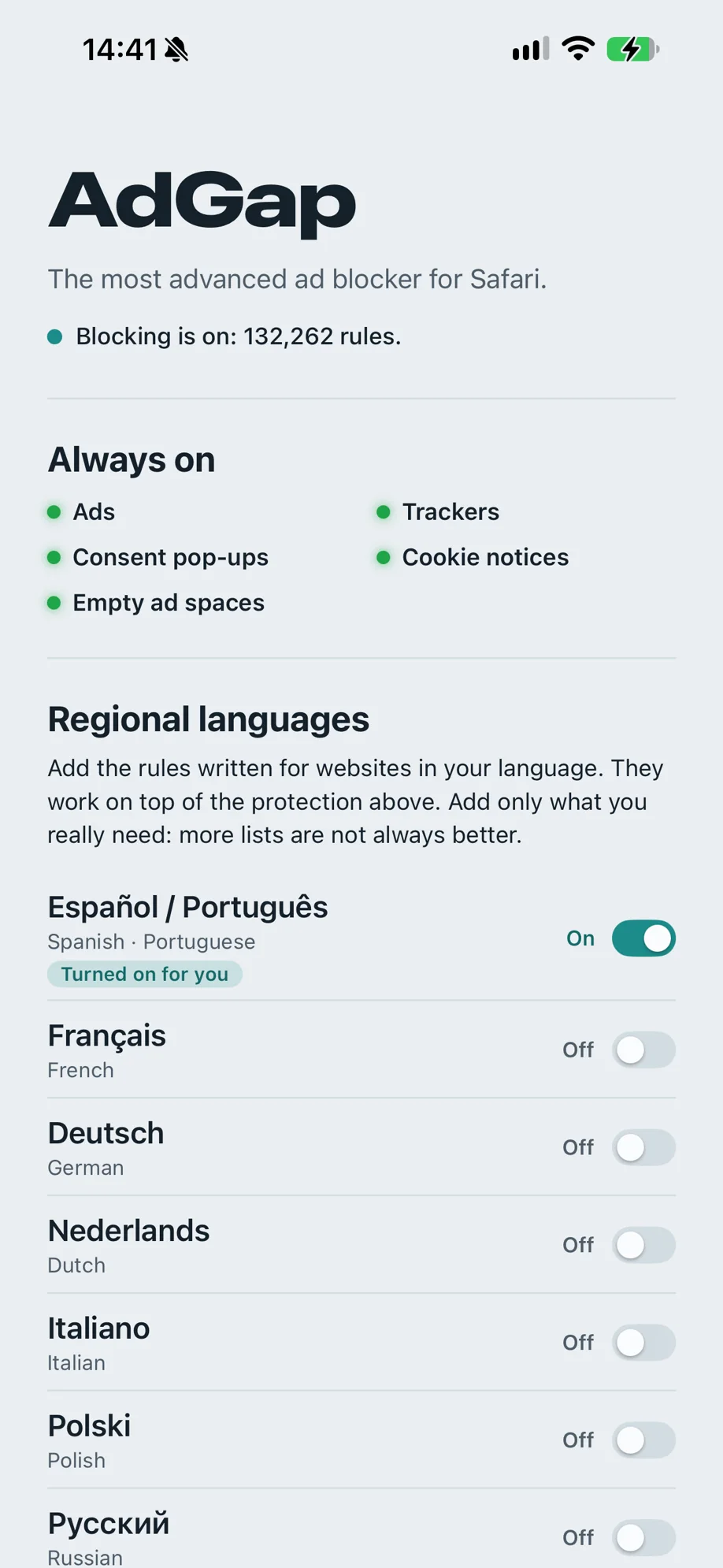 The AdGap app on an iPhone: blocking is on with 132,262 rules; ads, trackers, consent pop-ups, cookie notices and empty ad spaces always on; a list of regional languages.